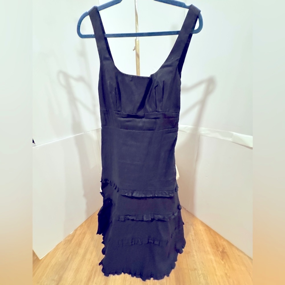 Anthropologie Black Dress.Drops 32 inches from waist. Cotton with spandex size M